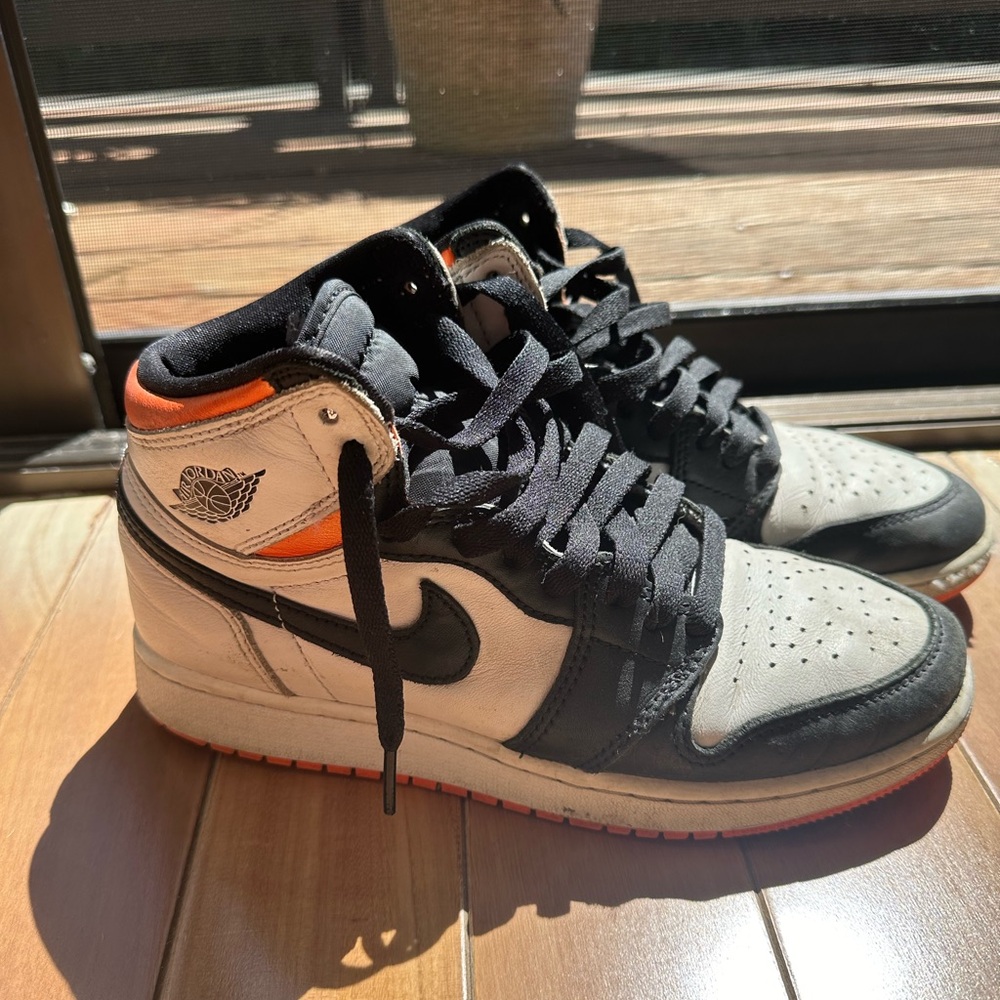 Youth Nike Air Jordan’s orange/black 5.5